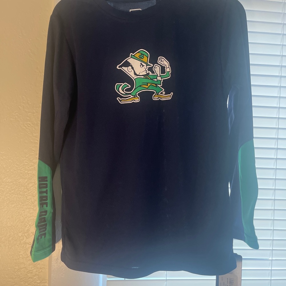 Boys Notre Dame shirt. Brand new with tags. Size medium.